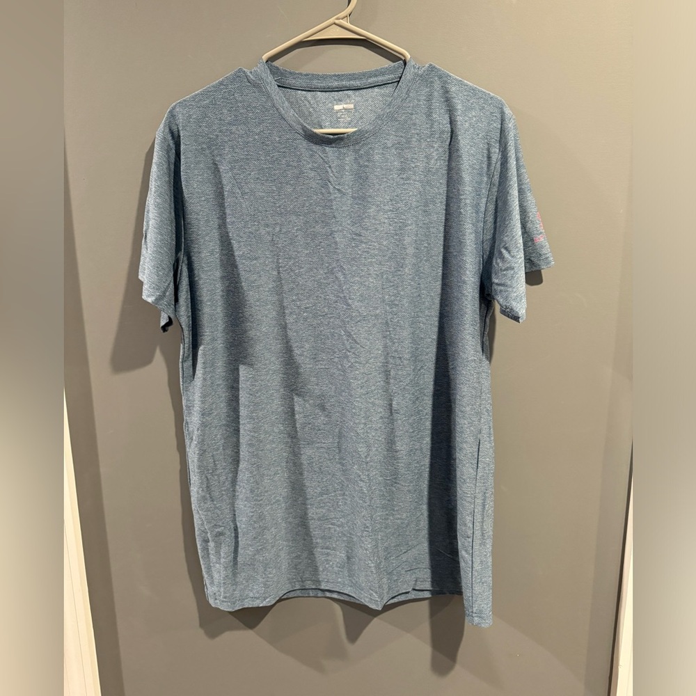 Spyder Drifit shirt Size L. Never worn. Too small